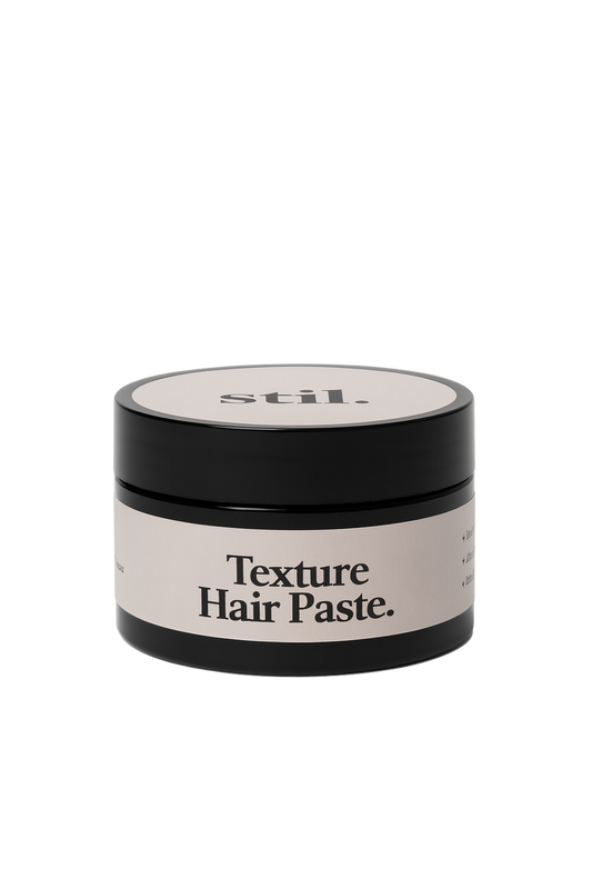 Jar of 'stil.' Texture Hair Paste on a white background