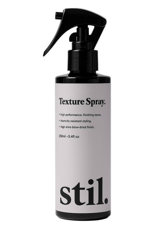 Texture spray bottle with 'stil.' branding on a white background
